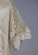 Sleeve detail from Wedding dress, jacket, and slip. Cream linen and taffeta with crocheted lace, 1910.